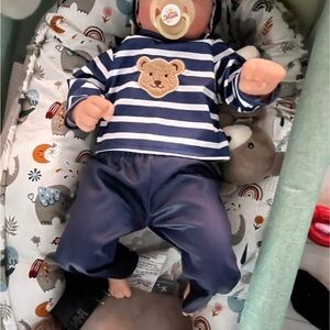Reborn baby doll with Striped Baby Outfit with Bear Patch - sound effects & more